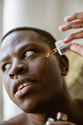 Men using face oil