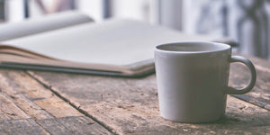 picture of coffee cup and journal