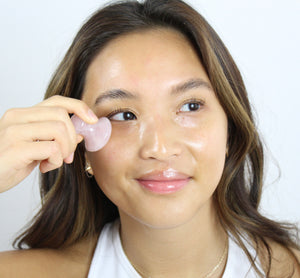 gua sha being used on face